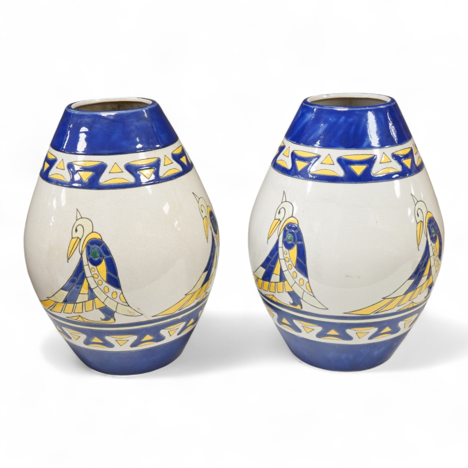 A pair of contemporary Boch Keramis pottery stylised Egyptian bird vases, 31cm high